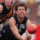 Ratten dishes off handball Vs Tigers.
