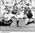1989 Rd 1 - Dorotich & Madden about to wrap up McPherson.Pic: Inside Football.