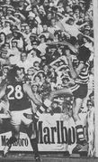 1977 Rd 1 - Percy watches as Blake misses footy.