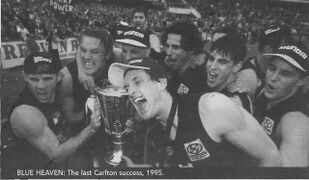 Blues celebrate the win.