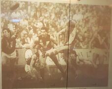 1983 State of Origin Match; Future Blue Peter Motley gets a clearing kick.