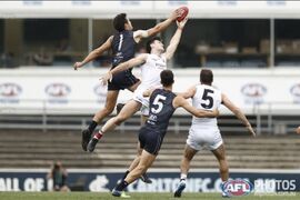 2022 - Practice Match; Jack Silvagni at a centre bounce.