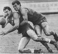 1991 - Ex Blue; Golden Square's Dean Strauch lays a tackle.