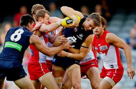 Kreuzer and Cripps in a 2016 pre-season match against Sydney Image courtesy of Carlton Media.