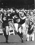 Vin Waite Repels Richmond.Carlton versus Richmond. Players are (left to right); Brent Crosswell (Carlton), Vin Waite (Carlton), Neil Balme (Richmond), Kevin Sheedy (Richmond). Edited image - originally submitted by anthonydebolfo.