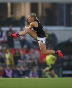 2020 Rd 5 - Tayla Harris launches into a long bomb.