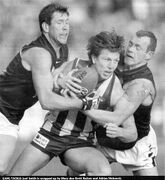 2001 Rd 17 - Ratten & Hickmott tackle Smith.