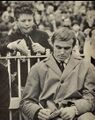 Alex Jesaulenko signing an autograph for a young fan.